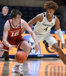 No. 12 Oklahoma outlasts No. 14 West Virginia in double OT, 91-90